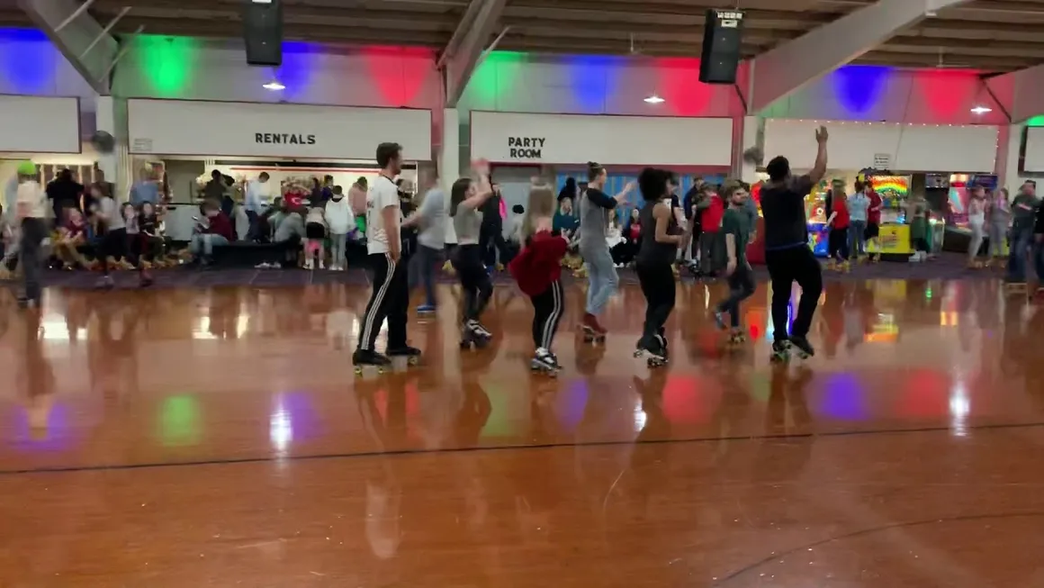 Skaters dancing in the middle of the rink